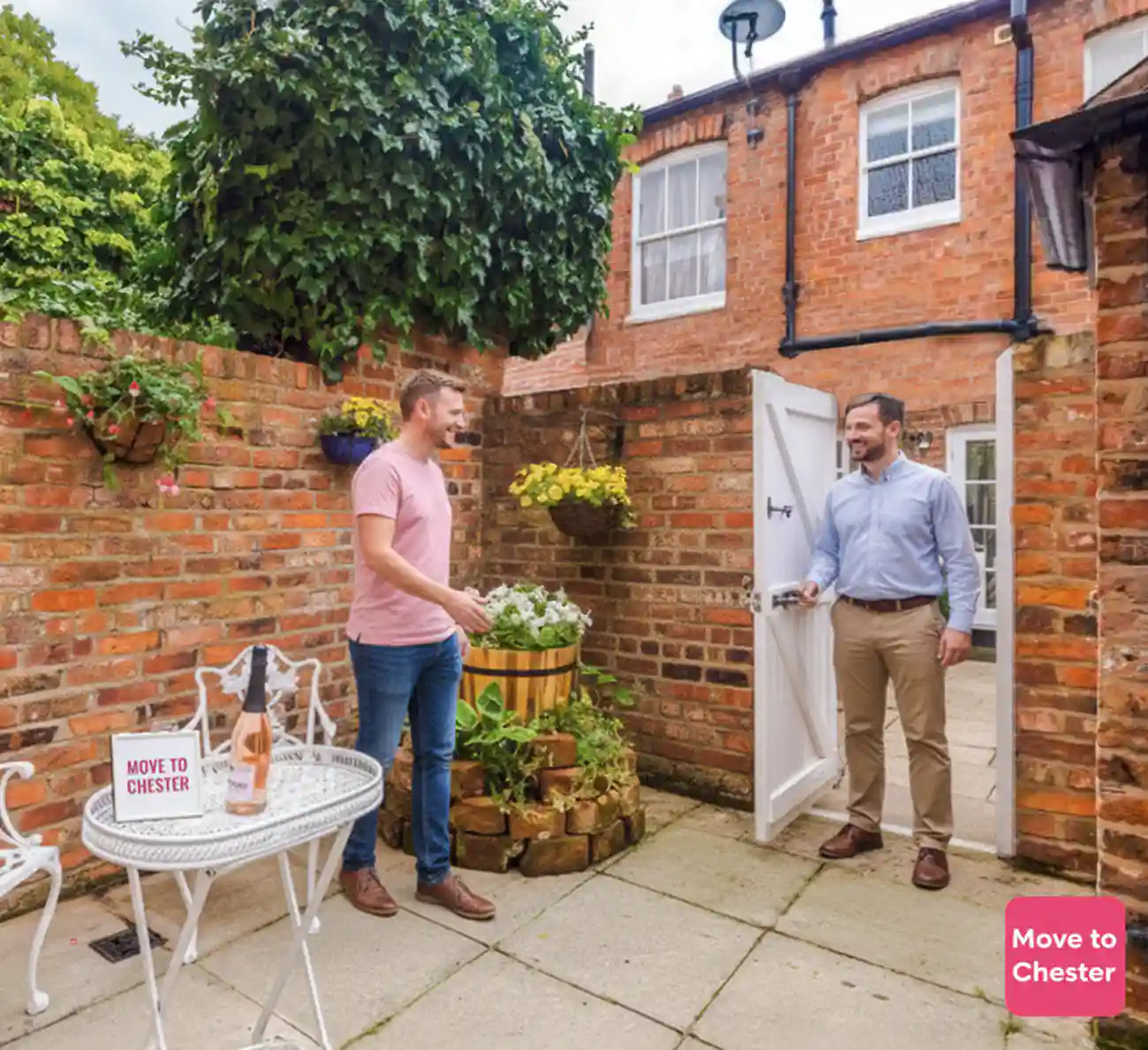 Couple researching Chester properties online and booking remote property viewing service with Move to Chester guides